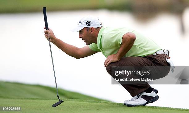 Cameron Percy lines up his put on the 18th hole of during the first hole of a playoff in the final round of the Justin Timberlake Shriners Hospitals...