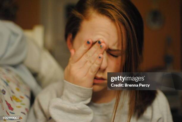 girl rubbing her eyes - emotionella pubertetsbesvär bildbanksfoton och bilder