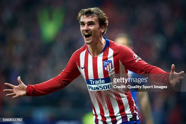 Antoine Griezmann of Atletico de Madrid celebrates after the third goal of his team scored by Diego Godin during the La Liga match between Club...
