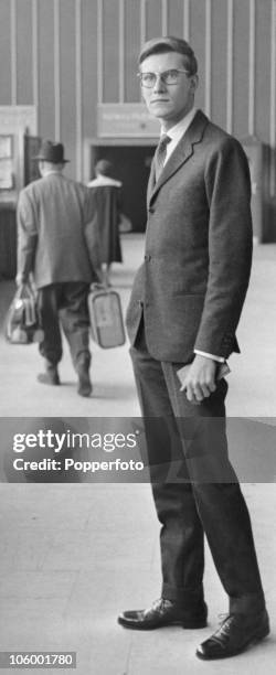 French fashion designer Yves Saint Laurent arriving at London Airport , 12th September 1958. He is in the UK to arrange a show of his Autumn...