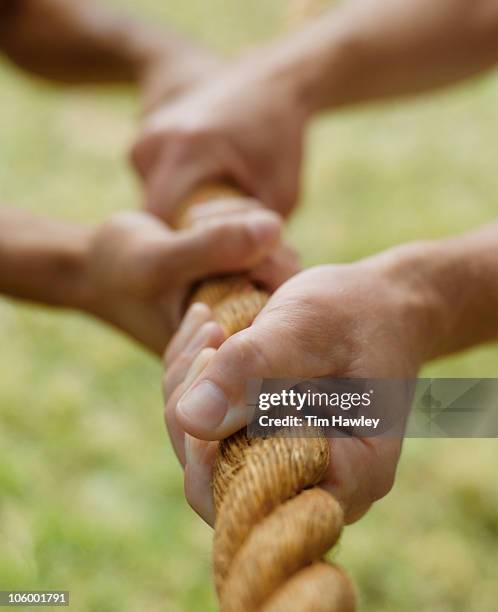 Two Hand Rope Pull 190 Two Hands Pulling A Rope Stock Photos, High-Res Pictures, and ...