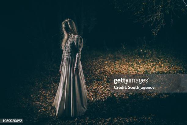 undead woman in the dark - horror story stock pictures, royalty-free photos & images