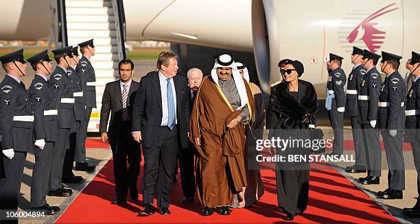 The Emir of Qatar, Sheikh Hamad bin Khalifa al Thani , and his wife Sheikha Mozah are greeted by the Queen's representative Viscount Hood,...