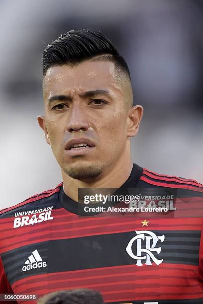 Fernando Uribe of Flamengo listens to the national anthem before the match between Botafogo and Flamengo as part of Brasileirao Series A 2018 at...