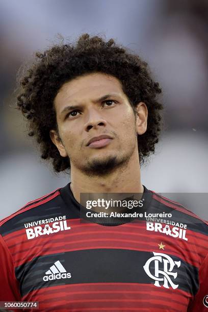 Willian Arão of Flamengo listens to the national anthem before the match between Botafogo and Flamengo as part of Brasileirao Series A 2018 at...