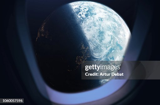 The planet earth taken from the spaceship window during outer space trip. The planet earth taken from the spaceship window during outer space trip.
