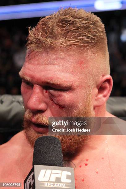 Brock Lesnar is interviewed by Joe Rogan after losing to Cain Velasquez by first round TKO in their heavyweight title bout during UFC 121 on October...