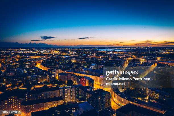 nighttime aerial of the sörnäinen city district in helsinki - helsinki fotografías e imágenes de stock