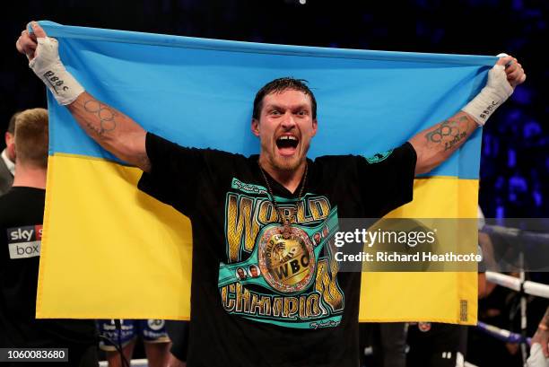 Oleksandr Usyk of Ukraine celebrates victory over Tony Bellew of England after the WBC, WBA, WBO, IBF & Ring Magazine World Cruiserweight Title Fight...