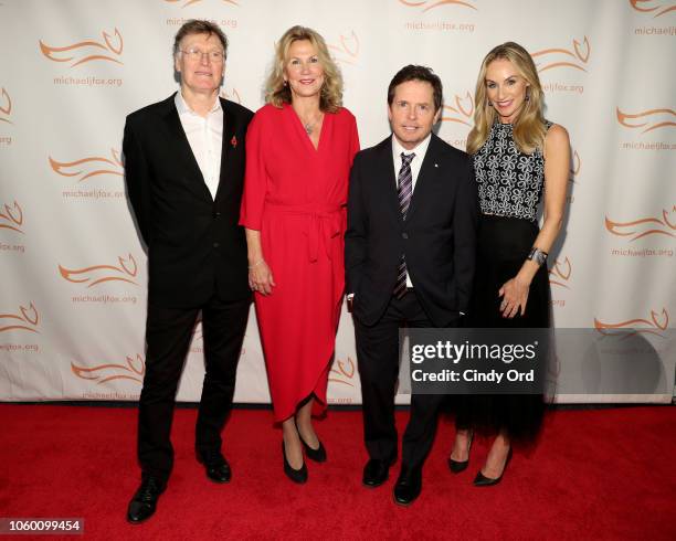 Steve Winwood, Eugenia Winwood, Michael J. Fox, and Tracy Pollan on the red carpet of A Funny Thing Happened On The Way To Cure Parkinson's...