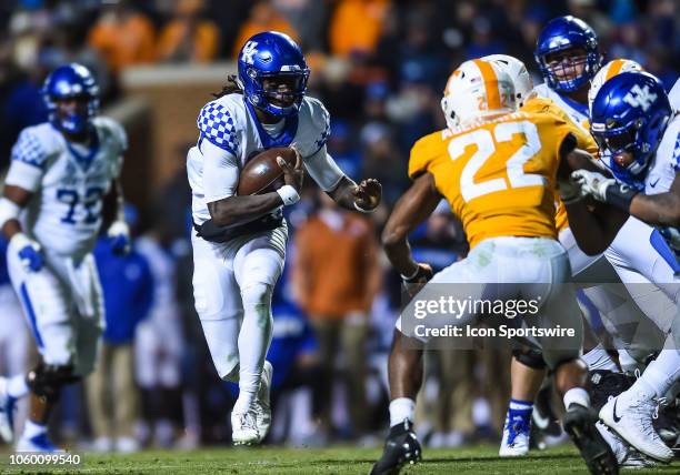 Kentucky Wildcats quarterback Terry Wilson runs the ball during a college football game between the Tennessee Volunteers and Kentucky Wildcats on...