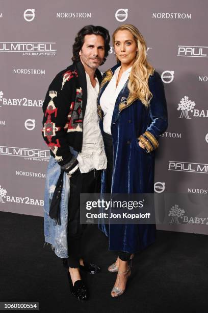 Greg Lauren and Elizabeth Berkley attend the 2018 Baby2Baby Gala Presented by Paul Mitchell at 3LABS on November 10, 2018 in Culver City, California.