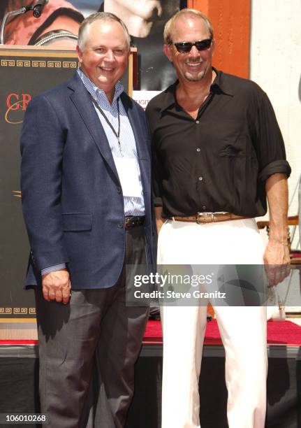 Dick Cook of Disney and Kevin Costner during Kevin Costner Hand & Footprints Ceremony at Grauman's Chinese Theatre in Hollywood, California, United...