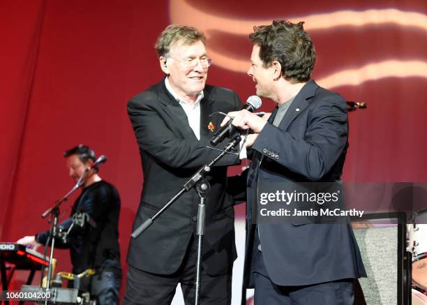 Steve Winwood and Michael J. Fox speak on stage at A Funny Thing Happened On The Way To Cure Parkinson's benefitting The Michael J. Fox Foundation at...