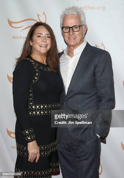 Actors Talia Balsam and John Slattery attend A Funny Thing Happened on the Way to Cure Parkinson's 2018 at the Hilton New York on November 10, 2018...