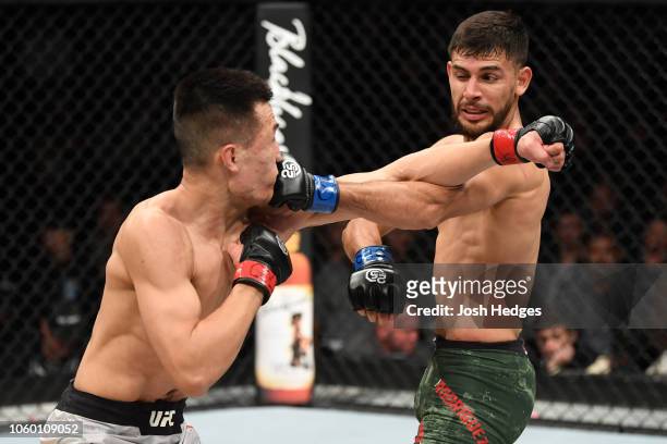 Yair Rodriguez of Mexico punches Chan Sung Jung of South Korea in their featherweight bout during the UFC Fight Night event inside Pepsi Center on...