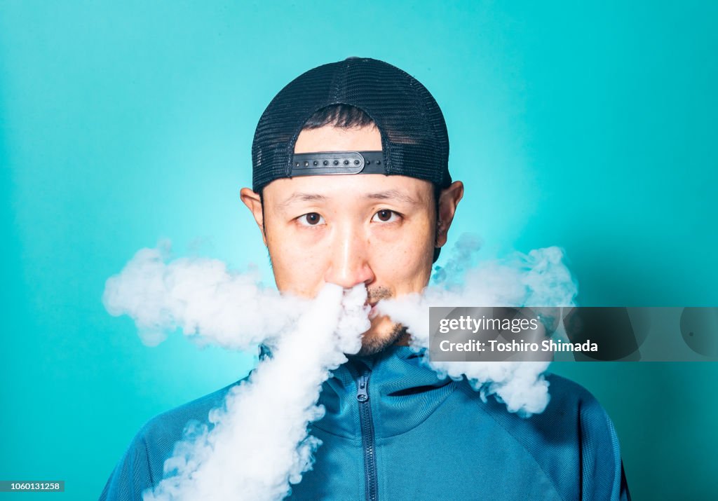 Vape Tricks For Beginners Woman Vaping And Blowing Smoke Of Electronic Cigarette From Nose Stock Photo Australia Ghost Inhale Vape Tricks For Beginners Woman Vaping And Blowing Smoke Of Electronic Cigarette From Nose Stock Photo Australia Ghost Inhale