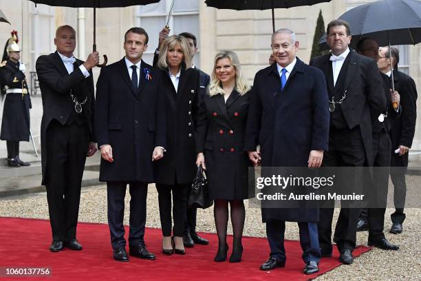 French President Emmanuel Macron and French First Lady Brigitte Macron , welcome Prime Minister of Israel Benjamin Netanyahu and his wife Sara...