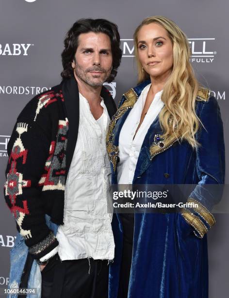 Greg Lauren and Elizabeth Berkley attend the 2018 Baby2Baby Gala Presented by Paul Mitchell at 3LABS on November 10, 2018 in Culver City, California.