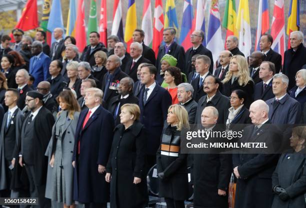 Morocco's Prince Moulay Hassan, Moroccan King Mohammed VI, US First Lady Melania Trump, US President Donald Trump, German Chancellor Angela Merkel,...