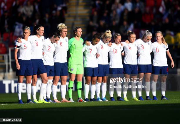 England players observe a silence for Remembrance Day prior to during the International Friendly match between England Women and Sweden Women at The...