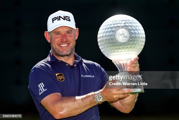 Lee Westwood of England poses with the trophy after winning the Nedbank Golf Challenge at Gary Player CC on November 11, 2018 in Sun City, South...