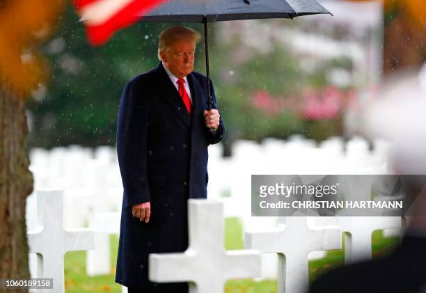 President Donald Trump visits the American Cemetery of Suresnes, outside Paris, on November 11, 2018 as part of Veterans Day and the commemorations...