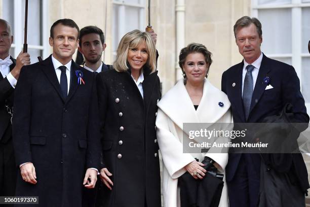 French President Emmanuel Macron and French First Lady Brigitte Macron welcome Henri the Grand Duke of Luxembourg and his wife Maria Teresa, Grand...