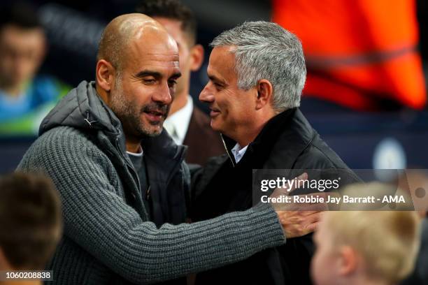 Pep Guardiola the head coach / manager of Manchester City and Jose Mourinho the head coach / manager of Manchester United during the Premier League...