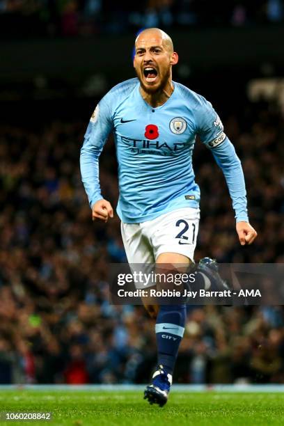 David Silva of Manchester City celebrates after scoring a goal to make it 1-0 during the Premier League match between Manchester City and Manchester...