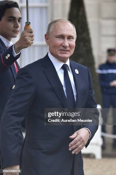 Vladimir Putin, President of Russia leaves the Elysee Palace after a lunch hosted by French President Emmanuel Macron for the commemoration of the...