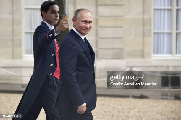 Vladimir Putin, President of Russia leaves the Elysee Palace after a lunch hosted by French President Emmanuel Macron for the commemoration of the...