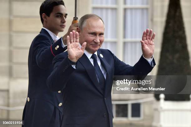 Vladimir Putin, President of Russia leaves the Elysee Palace after a lunch hosted by French President Emmanuel Macron for the commemoration of the...