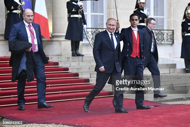 Vladimir Putin, President of Russia leaves the Elysee Palace after a lunch hosted by French President Emmanuel Macron for the commemoration of the...