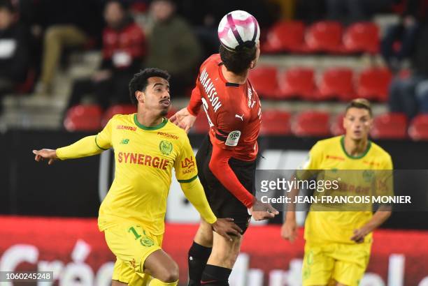 Rennes' Swedish midfielder Jakob Johansson vies with Nantes' Brazilian midfielder Lucas Evangelista and Nantes' Argentine forward Emiliano Sala...