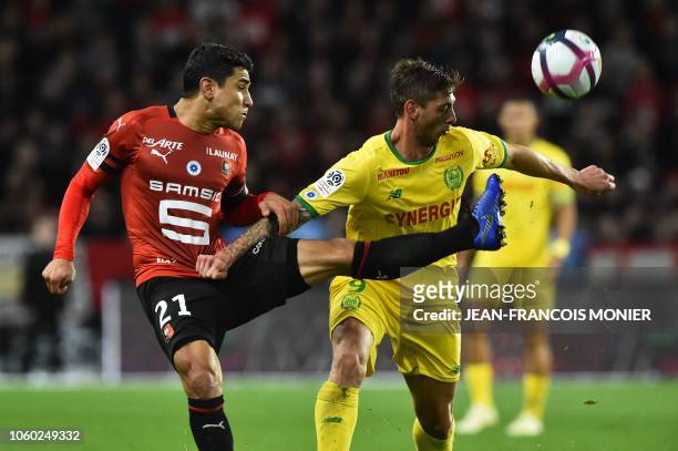 Rennes' French midfielder Benjamin Andre vies with Nantes' Argentine forward Emiliano Sala during the French L1 Football match between Rennes and...