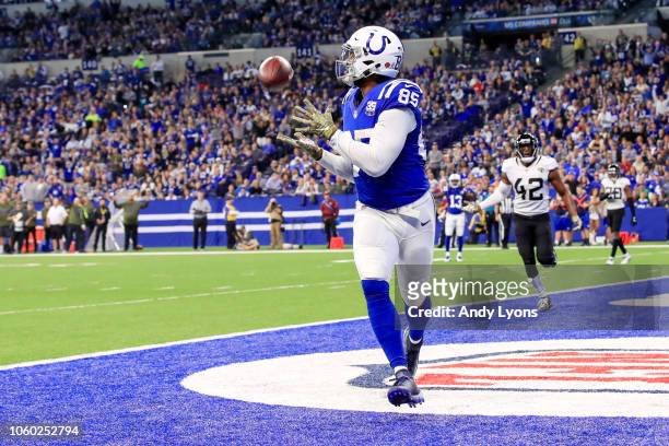 Eric Ebron of the Indianapolis Colts catches a touchdown pass in the game against the Jacksonville Jaguars in the second quarter at Lucas Oil Stadium...