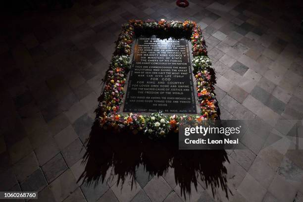 Flowers laid by Queen Elizabeth II and German President Dr Frank-Walter Steinmeier lay together at the grave of The Unknown Warrior after a service...