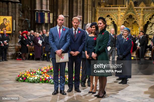 Prince William, Duke of Cambridge and Catherine, Duchess of Cambridge, Prince Harry, Duke of Sussex and Meghan, Duchess of Sussex attend a service...