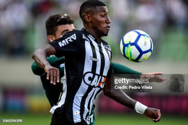 Emerson of Atletico MG and Victor Luis of Palmeiras battle for the ball during a match between Atletico MG and Palmeiras as part of Brasileirao...