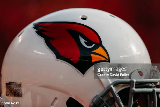 An Arizona Cardinals helmet sits on the sidelines during the second half of the game against the Kansas City Chiefs at Arrowhead Stadium on November...