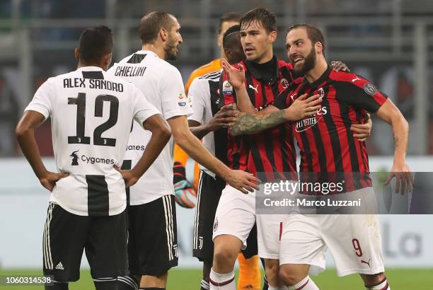 Gonzalo Higuain of AC Milan shows his anger for receiving the red card during the Serie A match between AC Milan and Juventus at Stadio Giuseppe...