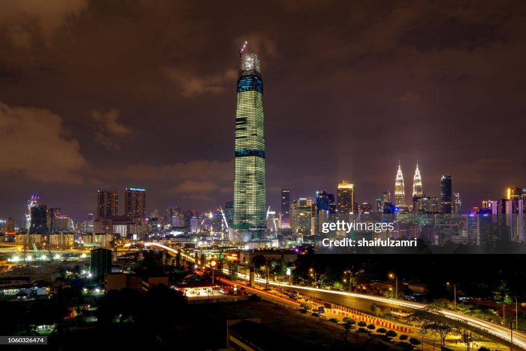 View of majestic sunset over Exchange 106 tower (formerly known as TRX Signature). The tower still under construction and will become tallest tower in Malaysia.