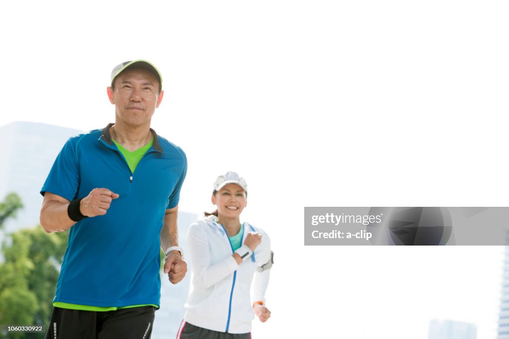 Mature Couples Jogging