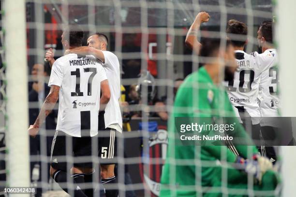 Mario Mandzukic of Juventus FC celebrates after scoring the his goal during the serie A match between AC Milan and Juventus FC at Stadio Giuseppe...