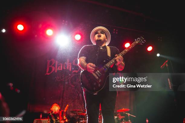 Singer Chris Robertson of the American band Black Stone Cherry performs live on stage during a concert on November 11, 2018 in Cologne, Germany.