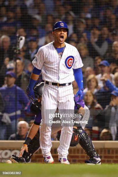 Willson Contreras of the Chicago Cubs celebrates during the National League Wild Card game against the Colorado Rockies at Wrigley Field on Tuesday,...