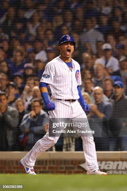 Willson Contreras of the Chicago Cubs celebrates during the National League Wild Card game against the Colorado Rockies at Wrigley Field on Tuesday,...