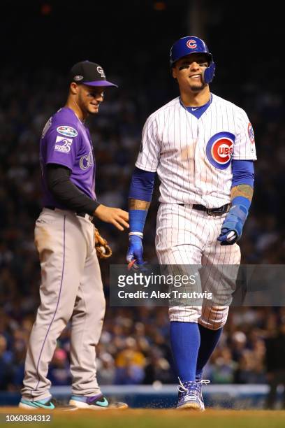 Javier Baez of the Chicago Cubs looks on during the National League Wild Card game against the Colorado Rockies at Wrigley Field on Tuesday, October...