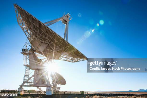 radio telescopes at sunset - national radio astronomy observatory stock pictures, royalty-free photos & images